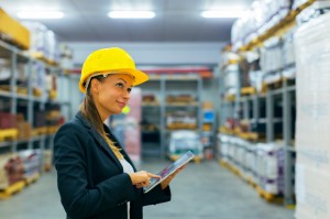 Woman in distribution center - Tier 2 WMS